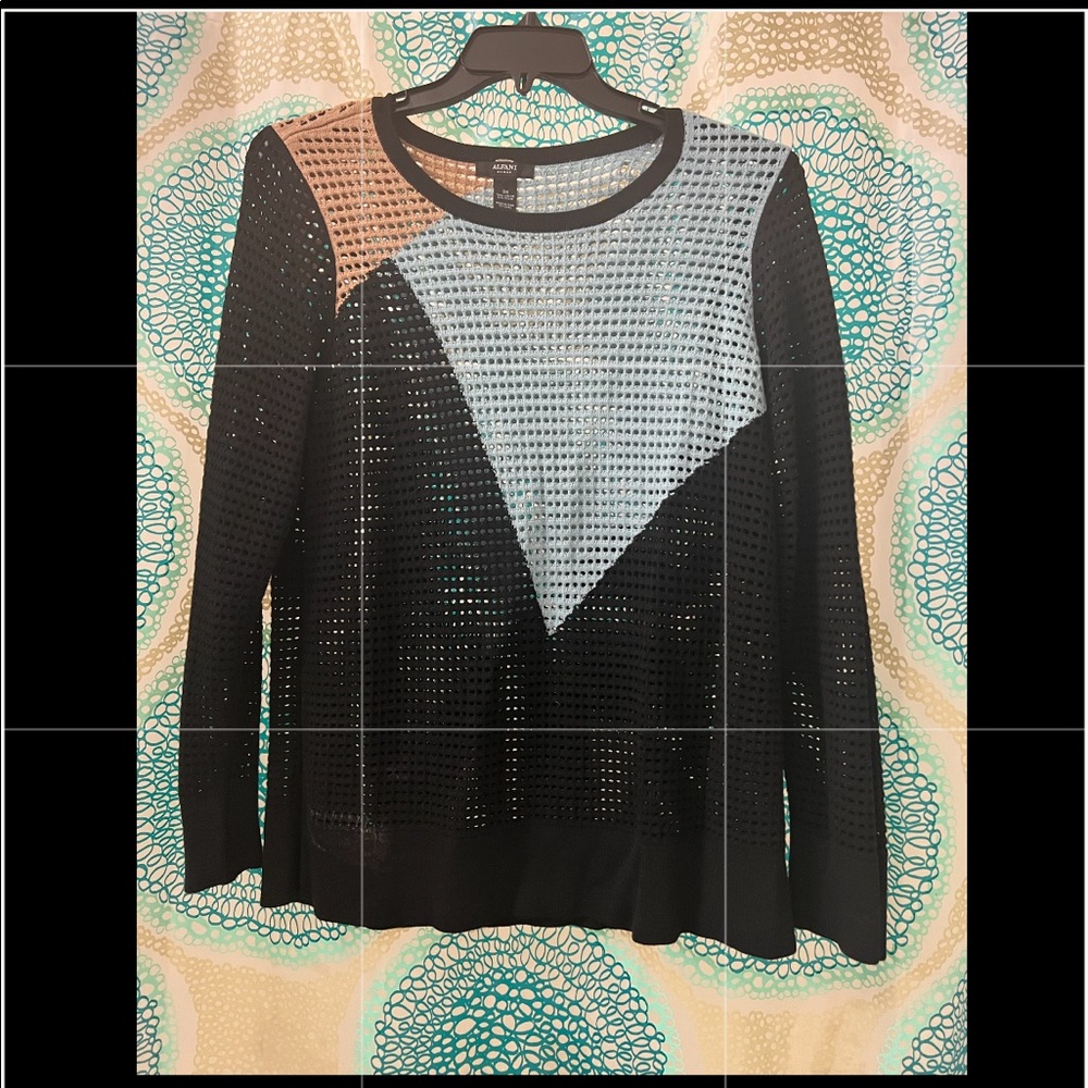 Asymmetric patterned sweater